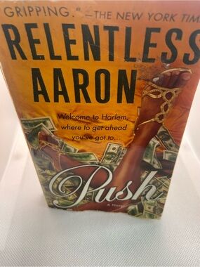 Relentless Aaron "Push" Paperback Book - Orange Cover with Gold Sandals
